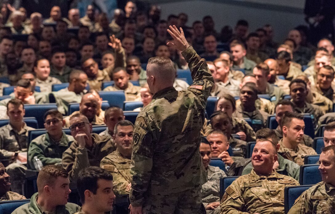 Army Command Sgt. Maj. John Wayne Troxell, senior enlisted advisor to the chairman of the Joint Chiefs of Staff, speaks to Team Dover members during an all call Dec. 3, 2019, inside the base theater at Dover Air Force Base, Del. Troxell addressed air mobility’s role in national defense and the importance of readiness during the event. (U.S. Air Force photo by Roland Balik)