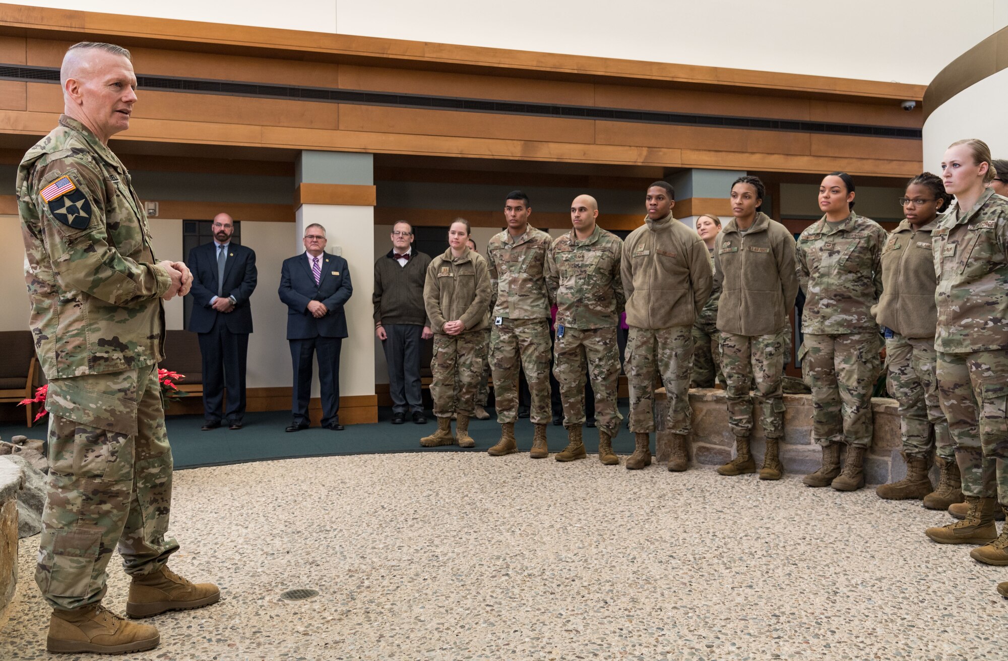 Army Command Sgt. Maj. John Wayne Troxell, senior enlisted advisor to the chairman of the Joint Chiefs of Staff, speaks to Air Force Mortuary Affairs Operations personnel, Dec. 3, 2019, on Dover Air Force Base, Del. Troxell thanked them for their service in providing dignity, honor and respect to fallen service members. (U.S. Air Force photo by Roland Balik)