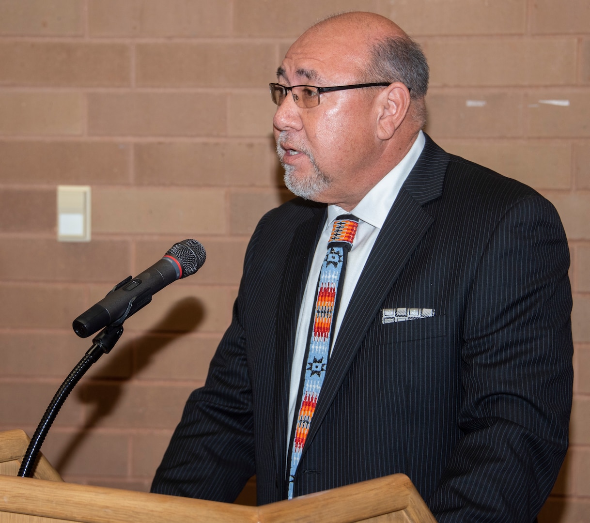 Dr. Lee “Eagleboy” Walters, a member of the Blackfeet Nation, speaks to the crowd during Brooke Army Medical Center’s National American Indian Heritage Month observance Nov. 26. Walters has worked with American Indian communities for more than 30 years.