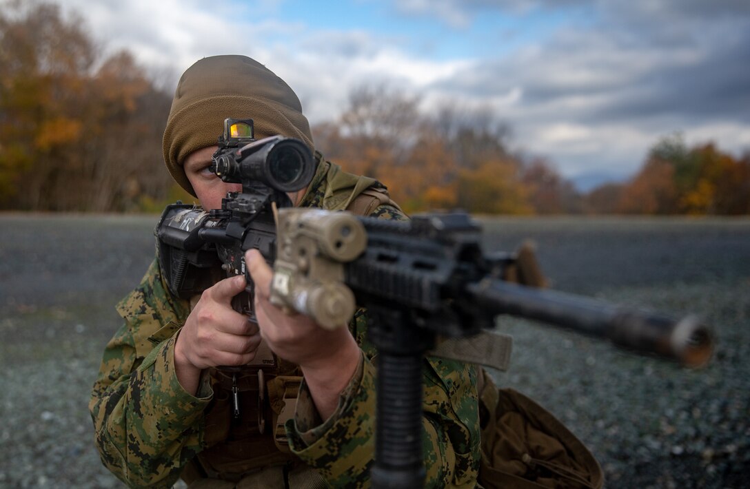 U.S. Marine Lance Cpl. Jeffrey Sleger with 1st Battalion, 25th Marine Regiment, currently assigned to 4th Marine Regiment, 3rd Marine Division, under the Unit Deployment Program, holds security during a patrol at Forest Light Middle Army in Aibano Training Area, Shiga, Japan, Dec. 3, 2019. Forest Light Middle Army is an annual training exercise that is designed to enhance the collective defense capabilities of the United States and Japan Alliance by allowing infantry units to maintain their lethality and proficiency in infantry and combined arms tactics.