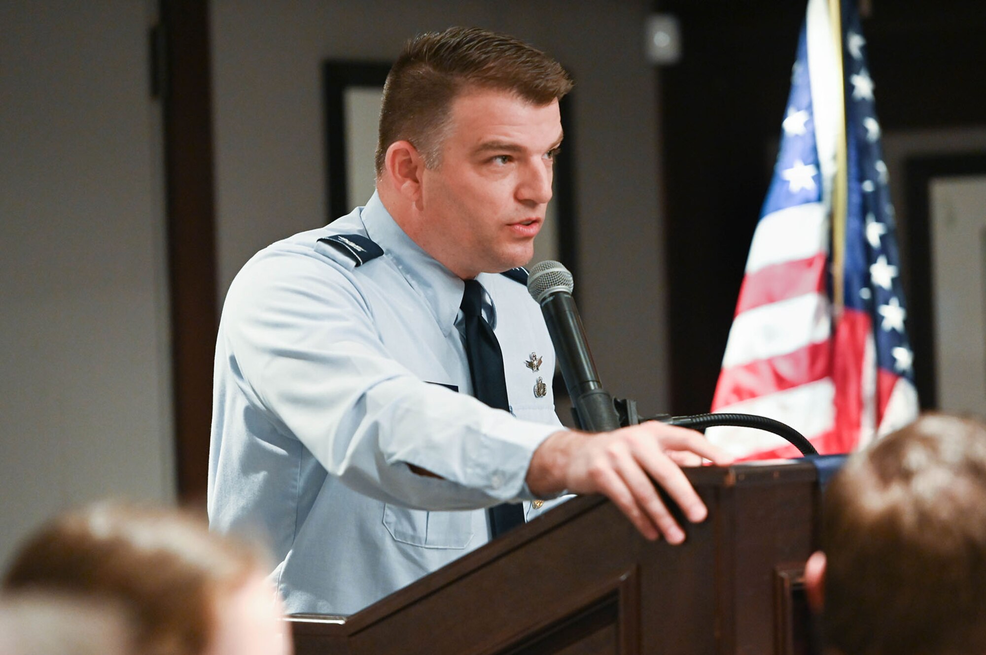 Col. Robert King, Enterprise IT & Cyber Infrastructure Division senior materiel leader at Hanscom Air Force Base, Mass., speaks to attendees during an AFCEA breakfast meeting in Lexington, Mass., Dec. 4.