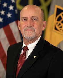 G. Eric Reid, U.S. Army Financial Management Command acting deputy to the commanding general, poses for a photo at the Maj. Gen. Emmett J. Bean Federal Center in Indianapolis Dec. 4, 2019. Prior to this assignment, Reid served as the USAFMCOM Army Financial Services director, where he worked closely with the Army commands, Department of Defense staff and agencies, U.S. Treasury, and Federal Reserve Banks on support for Army overseas operations and deployed Soldiers.