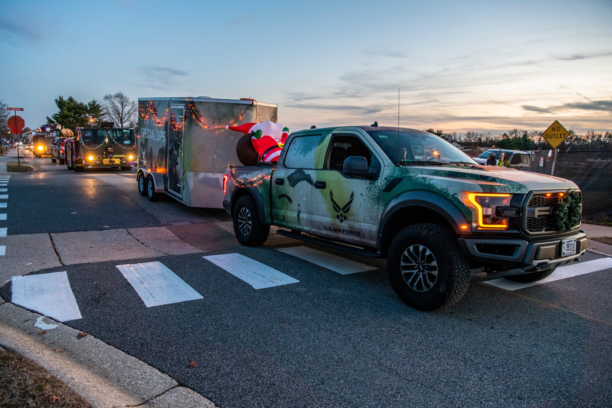 Airmen from Team Dover participate in the 2019 Dover Air Force Base Holiday Parade Dec. 3, 2019, at Dover Air Force Base, Del. A variety of military and first responder vehicles were decorated for the event. (U.S. Air Force photo by Senior Airman Christopher Quail)