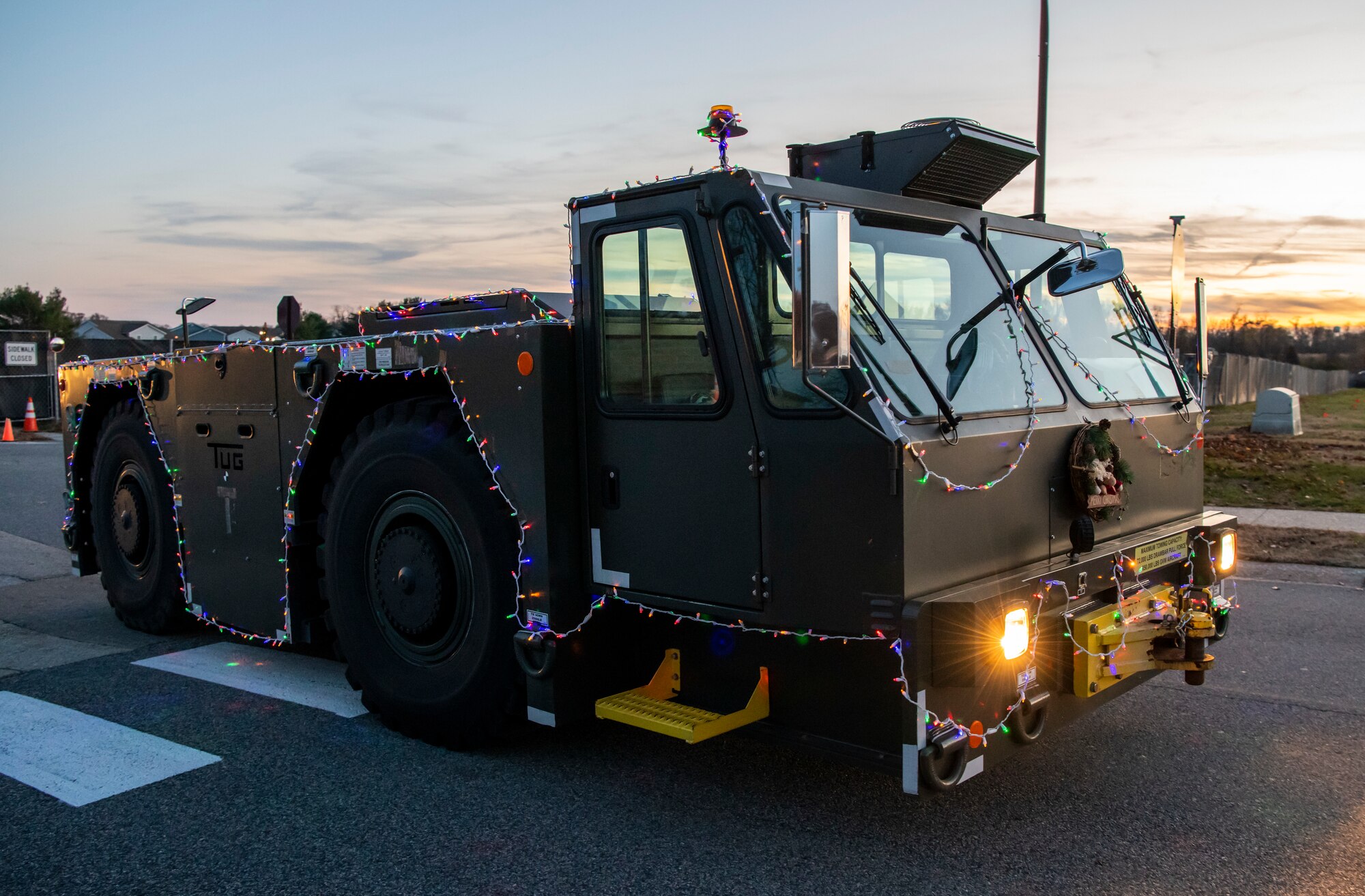 Airmen from Team Dover participate in the 2019 Dover Air Force Base Holiday Parade Dec. 3, 2019, at Dover Air Force Base, Del. A variety of military and first responder vehicles were decorated for the event. (U.S. Air Force photo by Senior Airman Christopher Quail)