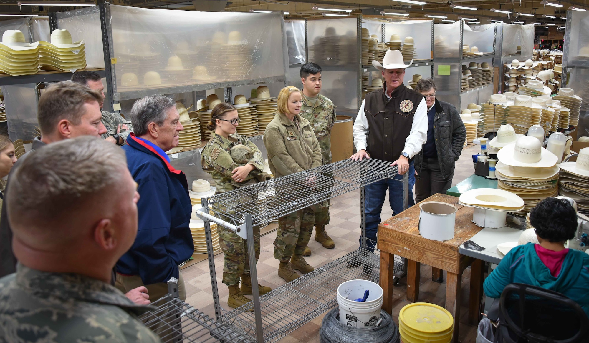 301st Fighter Wing Aircraft Maintenance Squadron Honorary Commander Mr. Keith Mundee (wearing cowboy hat), who is also the president of American Hat Co., led several members of the wing's leadership on a tour of American Hat Company in Bowie, Texas on November 15, 2019. The 301st Fighter Wing Honorary Commanders Program has invited civic leaders to many behind-the-scenes military tours but this was the first time we were hosted by one of our honorary commanders. (U.S. Air Force photo by Mr. Jeremy Roman)