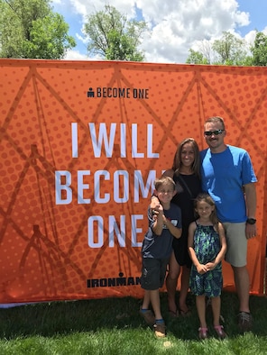 Master Sgt. Douglas Smits, the 35th Civil Engineer Squadron explosive ordnance disposal operations section chief, pauses for a photo with his family on the Kailua-Kona, Hawaii, June 10, 2018. Smits wanted to complete a marathon after a year of healing from a back surgery, but instead completed an Ironman World Championship. (Courtesy photo)
