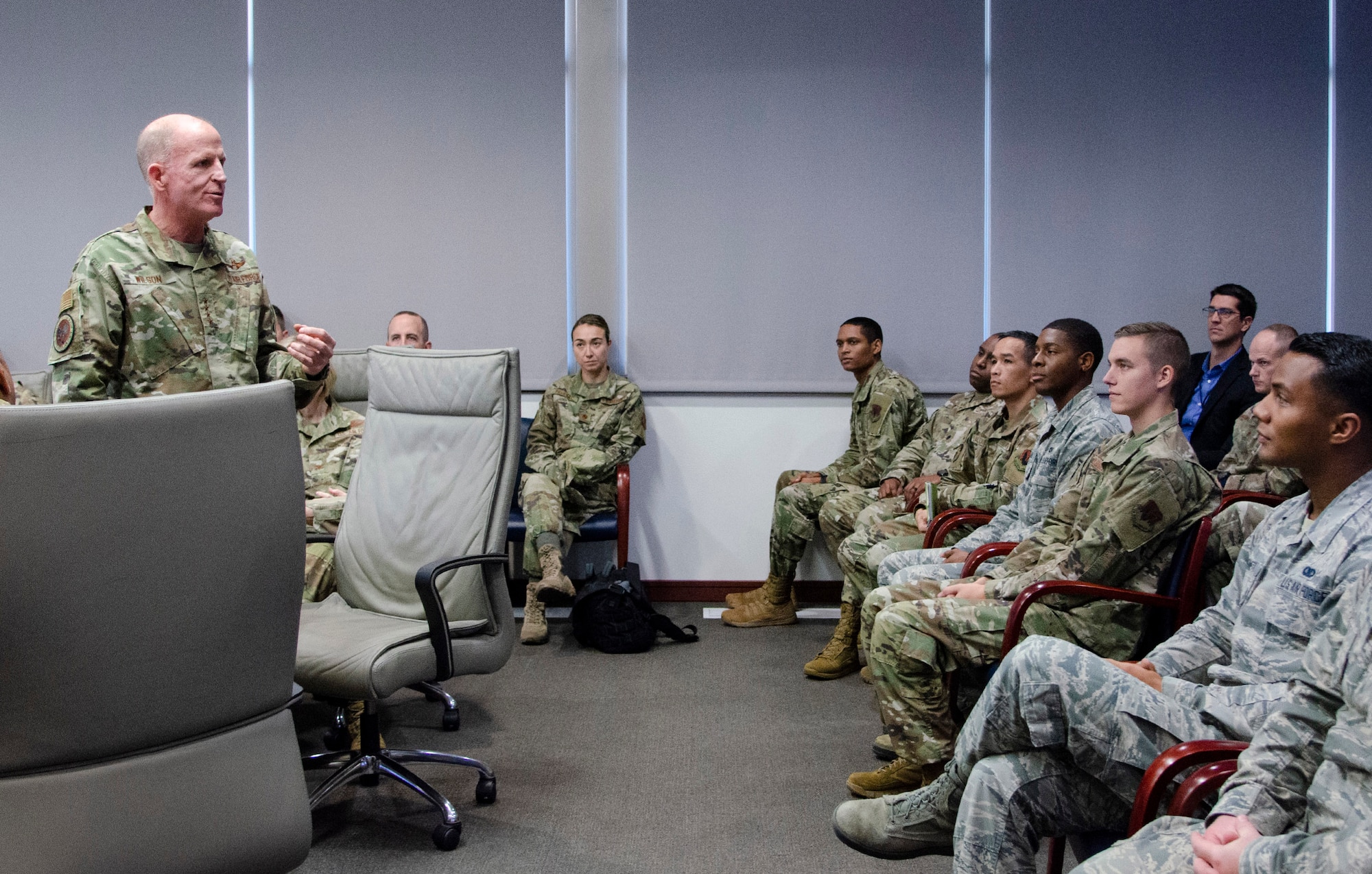Gen. Stephen W. "Seve" Wilson (standing), Air Force Vice Chief of Staff, meets with Airmen from the Air Force Technical Applications Center, Patrick AFB, Fla., Dec. 4, 2019 to commend members of the Department of Defense's sole nuclear treaty monitoring center for their work to deter global adversaries.  “AFTAC has some really smart people here who have come up with solutions to some very hard problems,” Wilson said.  (U.S. Air Force photo by Susan A. Romano)