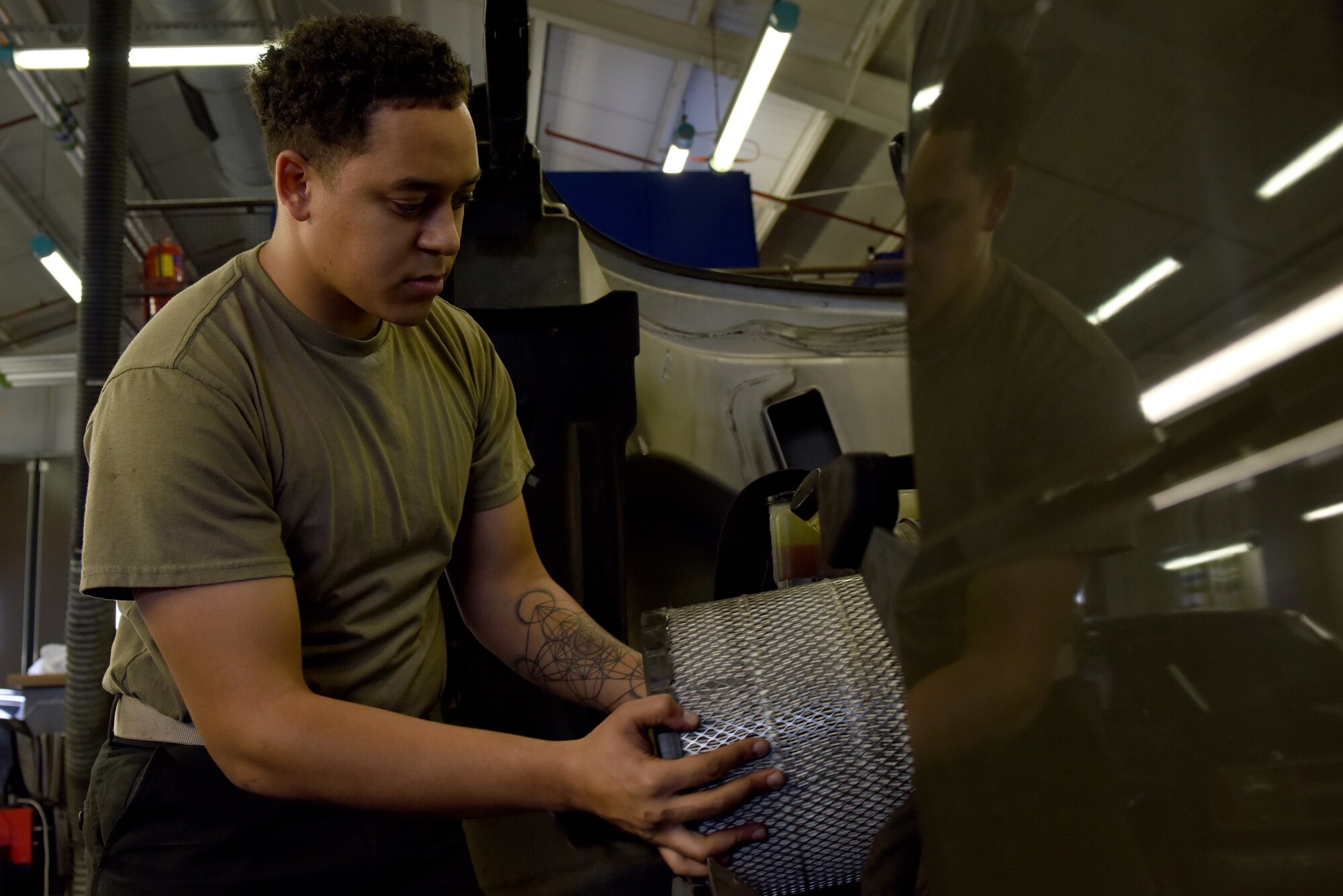 An Airman assigned to the 48th Logistics Readiness Squadron replaces a filter in an R-11 refueling truck at Royal Air Force Lakenheath, England, Nov. 22, 2019. The mission of the Vehicle Management flight is to ensure the readiness, reliability and longevity of the Liberty Wing vehicle fleet. (U.S. Air Force photo by Airman 1st Class Jessi Monte)