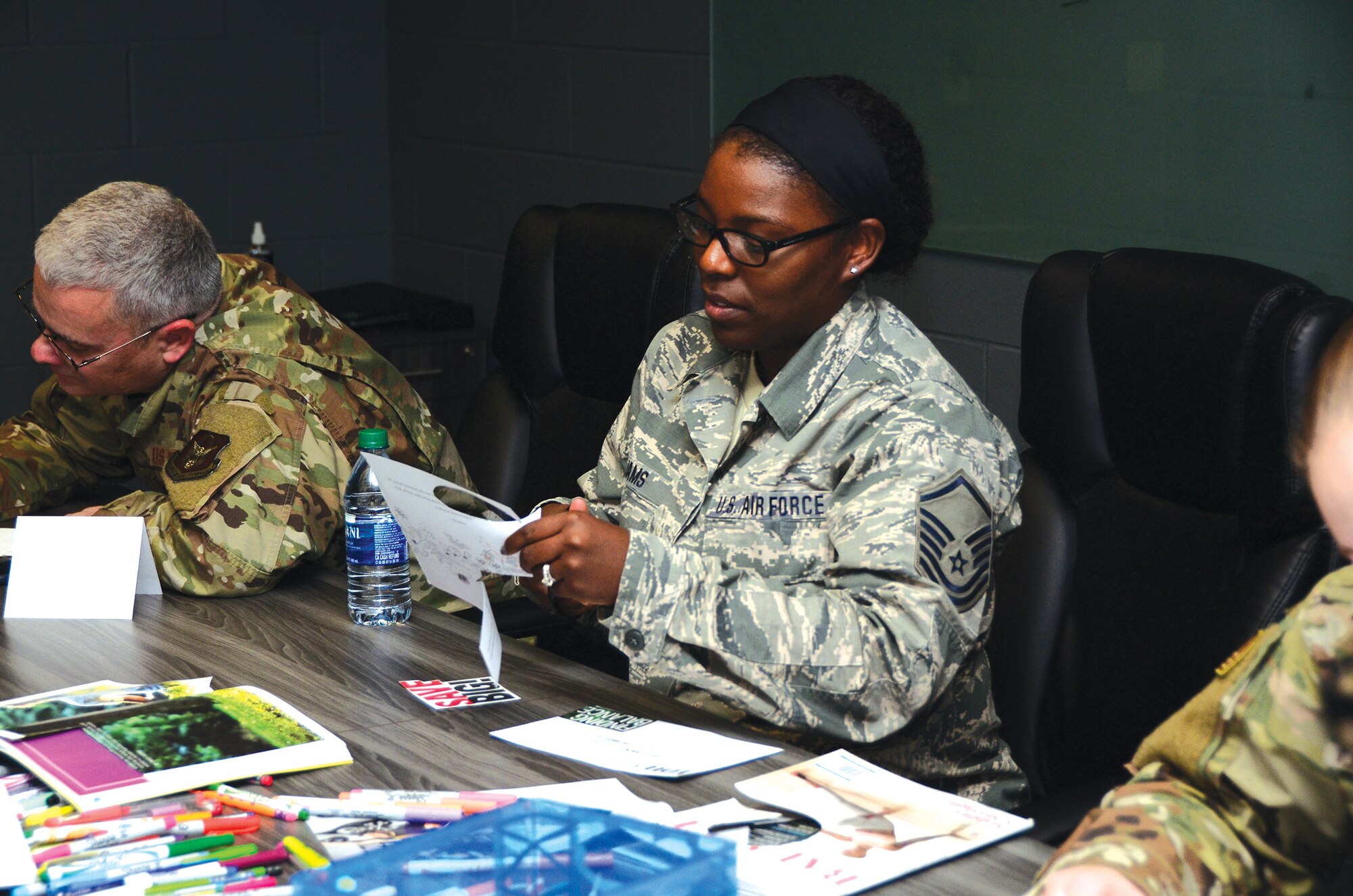 Master Sgts. Daniel Lewis and Sierra Williams create vision boards during the 445th Force Support Squadron Tactical Pause Day Nov. 3, 2019.