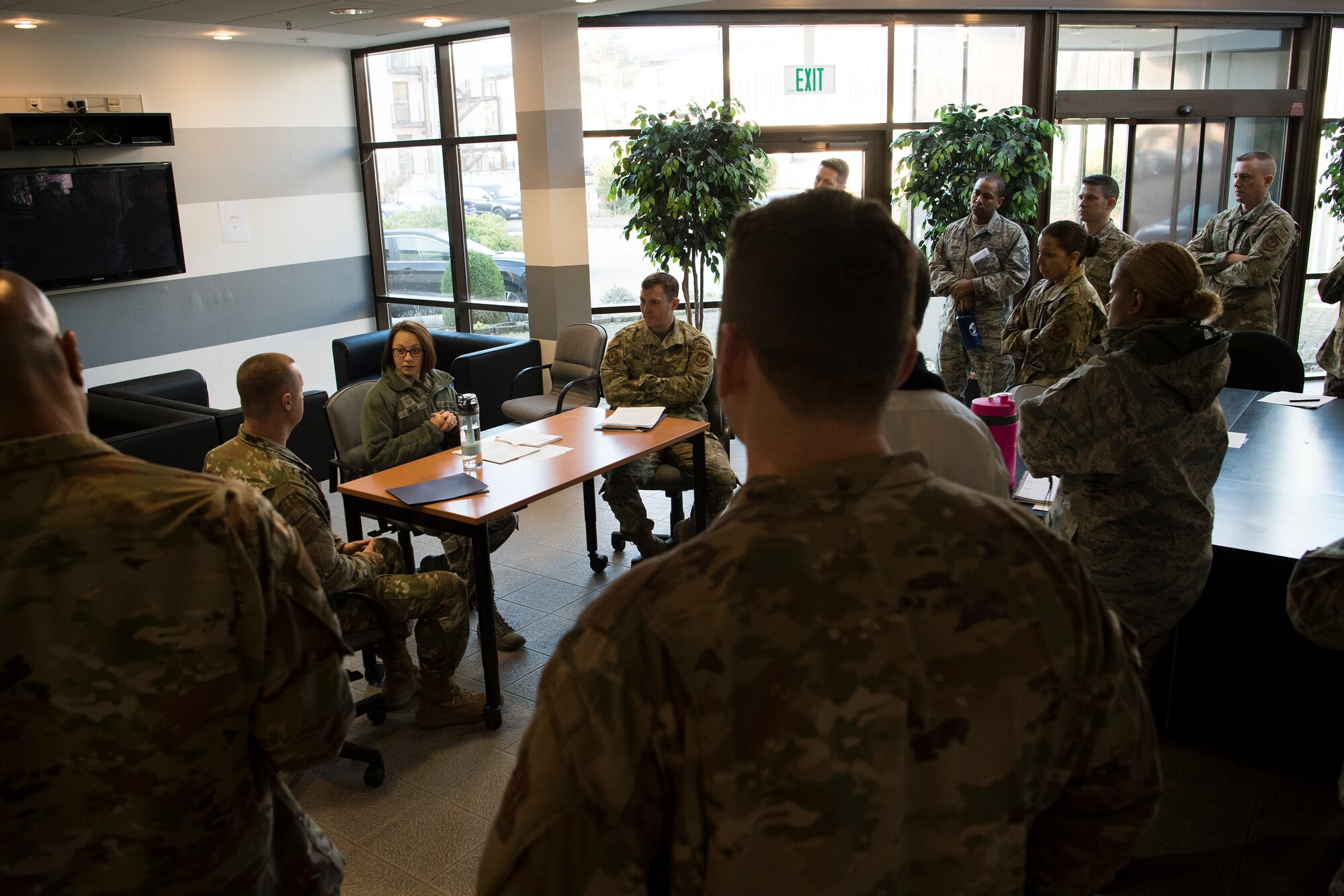 U.S. Air Force Senior Master Sgt. Shiloh Smith, 86th Logistics Readiness Squadron first sergeant, center, practices dispute resolution techniques during the Negotiation and Dispute Resolution Course held at the U.S. Air Forces in Europe and Air Forces Africa Conference Center, Ramstein Air Base, Germany, Dec. 4, 2019.