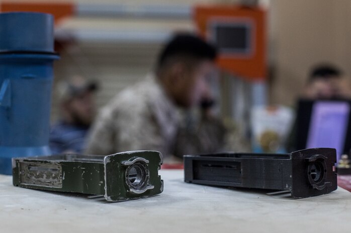 A U.S. Marine with Combat Logistics Battalion (CLB) 24, attached to Special Purpose Marine Air Ground Task Force-Crisis Response-Central Command, prepares to duplicate an Original Equipment Manufacturer (OEM) vehicle part for use within the battalion’s maintenance section in Kuwait, Aug. 28, 2019. A Marine Air Ground Task Force is specifically designed to be capable of deploying aviation, ground, and logistics forces forward at a moment’s notice.  (U.S. Marine Corps photo by Sgt. David Bickel)