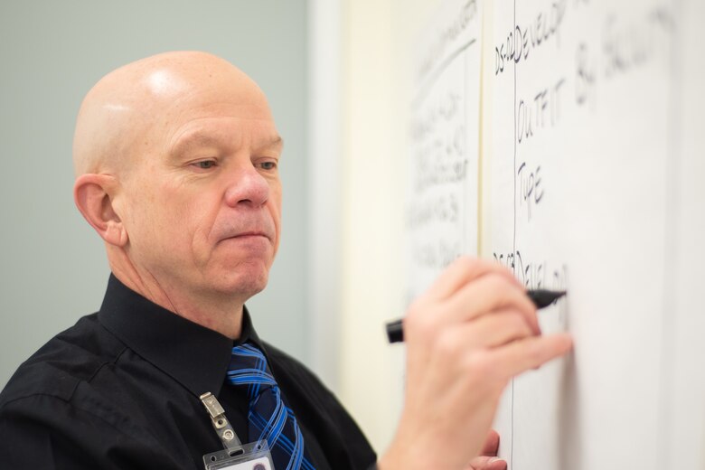 Randy Barber, a process improvement consultant who led a three-day value engineering workshop for the Furnishings Program, captures input from workshop participants at the U.S. Army Engineering and Support Center, Huntsville, Alabama, Nov. 5, 2019.