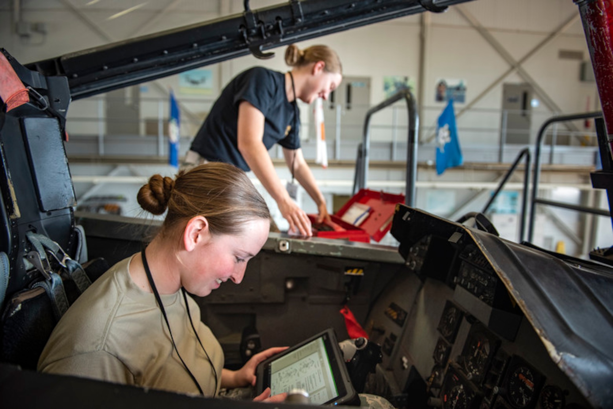 Airman 1st Class Christine Smith and Airman 1st Class Kaylie Cunningham, 364th Training Squadron electrical and environmental apprentice course students, remove and install an oxygen regulator on an F-15 Eagle at Sheppard Air Force Base, Texas, June 14, 2019. In an effort to expand learning opportunities for Airmen and enable training and education from any device, Air Education and Training Command has begun the Learning Wi-Fi Service project to install commercial wireless Internet across the command’s installations. (U.S. Air Force photo by Airman 1st Class Pedro Tenorio)