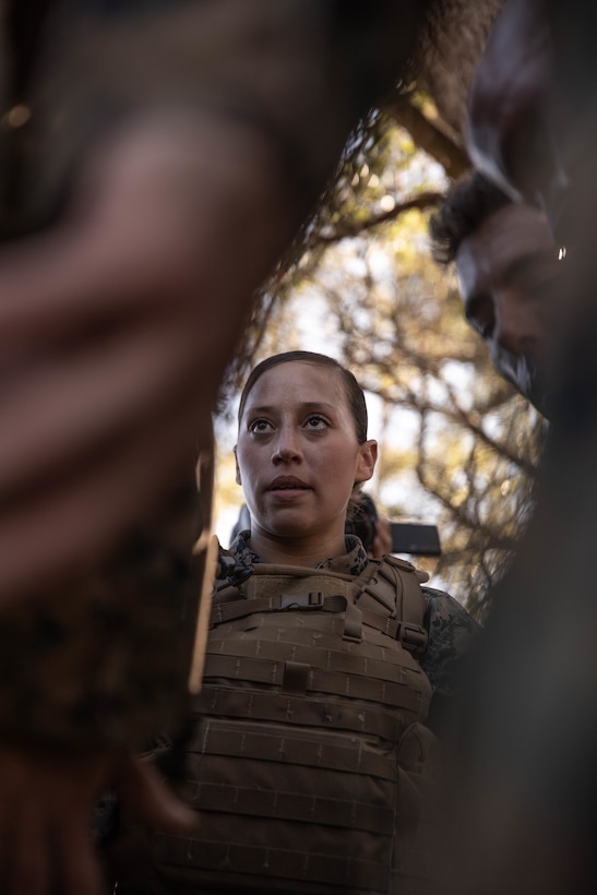 Sgt. Lynarae Pena, a tactical switching operator with Reserve Base Support, Marine Forces Reserve, assembles her classmates during Martial Arts Instructor Course 1-20 aboard Naval Air Station Joint Reserve Base New Orleans, Dec. 4, 2019. The course consists of both physical and mental challenges to mold Martial Arts Instructors. (U.S. Marine Corps photo by Pfc. Colby Bundy)
