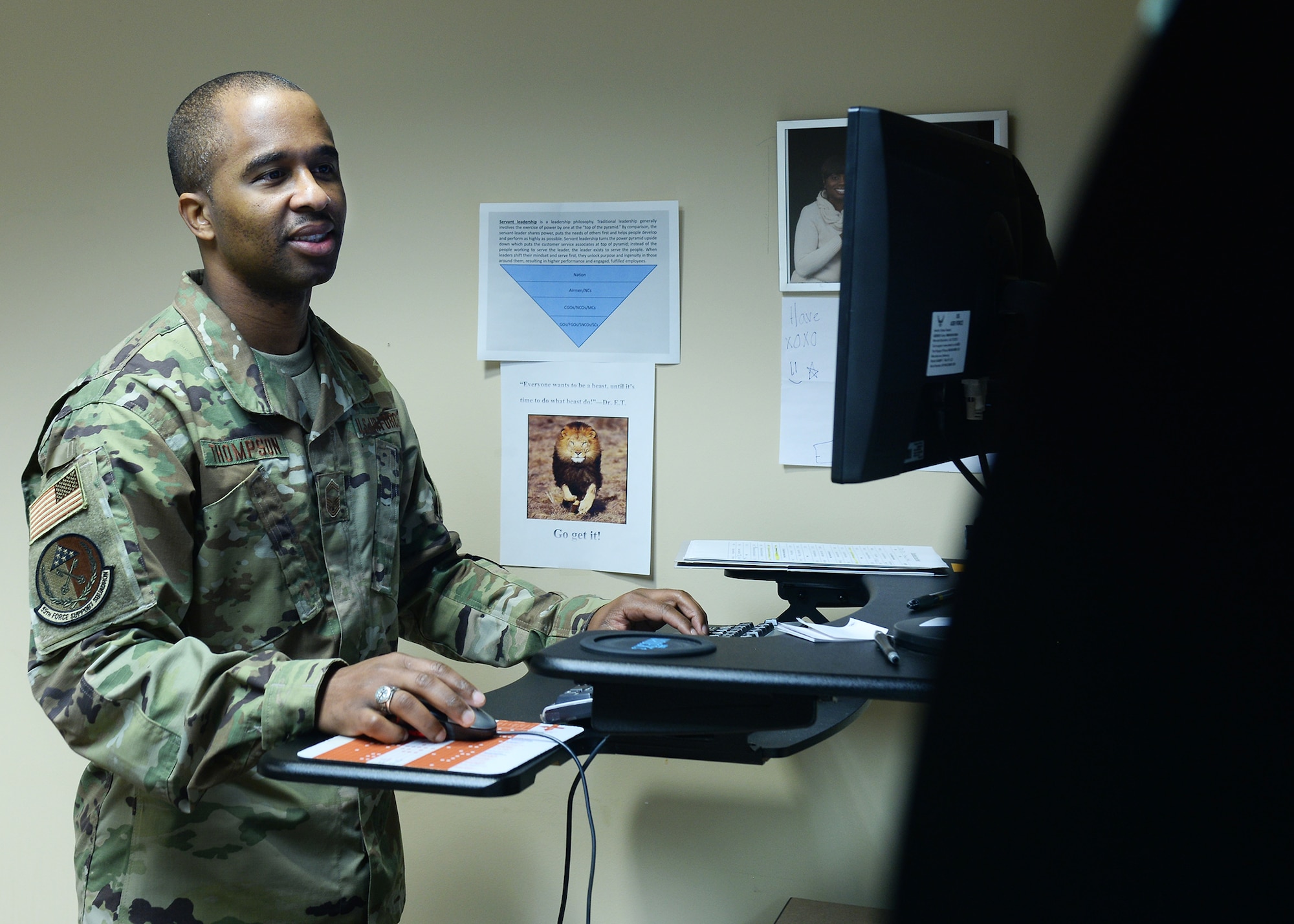 Senior Master Sgt. Anthony Thompson, 55th Force Support Squadron career assistance advisor, looks over his daily planner inside the Chief Master Sgt. James M. McCoy Airmen Leadership school at Offutt Air Force Base, Nebraska. As the CAA, Thompson manages professional enhancement and development opportunities for all officer, enlisted and civilian members here.