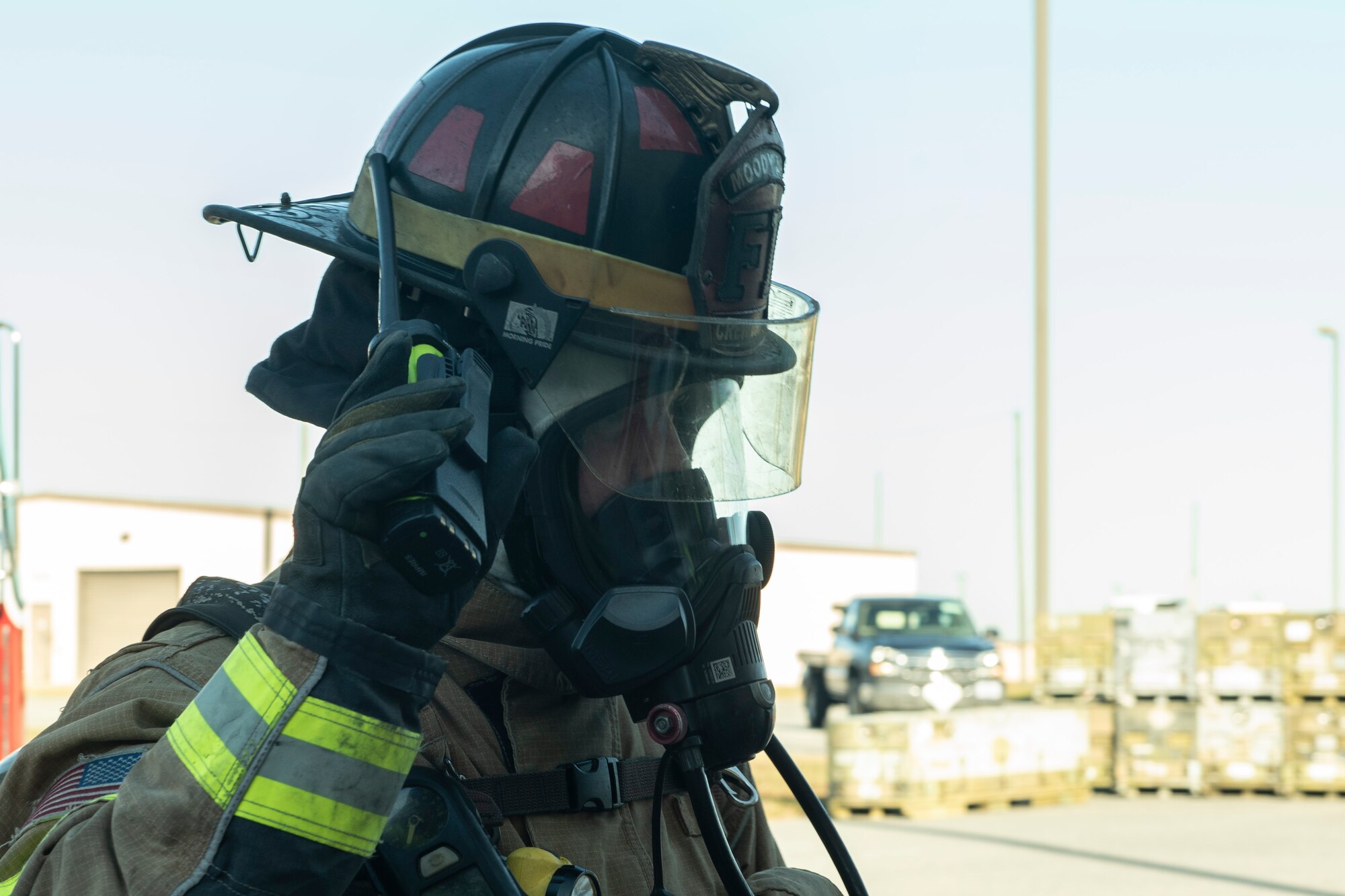 A photo of an Airman listening for an "all clear" through a radio.