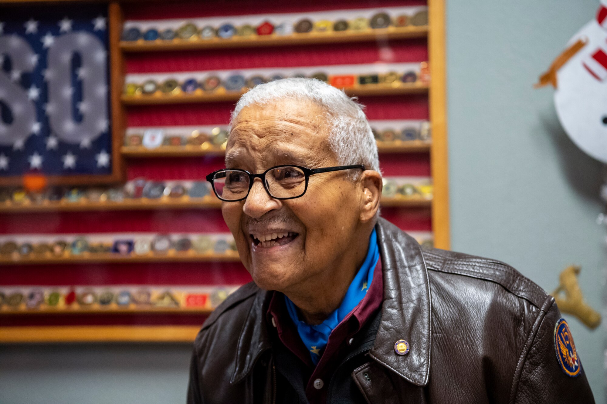 Former Tuskegee Airman, retired Col. Charles McGee, celebrates his birthday Dec. 6, 2019, at Dover Air Force Base, Del. McGee was born in Cleveland, Ohio, Dec. 7, 1919. He served a total of 30 years in the U.S. Air Force, beginning with the U.S. Army Air Corps, and flew a total of 409 combat missions in World War II, Korea and Vietnam. The Tuskegee program began in 1941 when the 99th Pursuit Squadron was established, and its Airmen were the first ever African-American military aviators in the U.S. Army Air Corps. (U.S. Air Force photo by Senior Airman Christopher Quail)