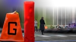 Graphic featuring a football pylon and goal marker.