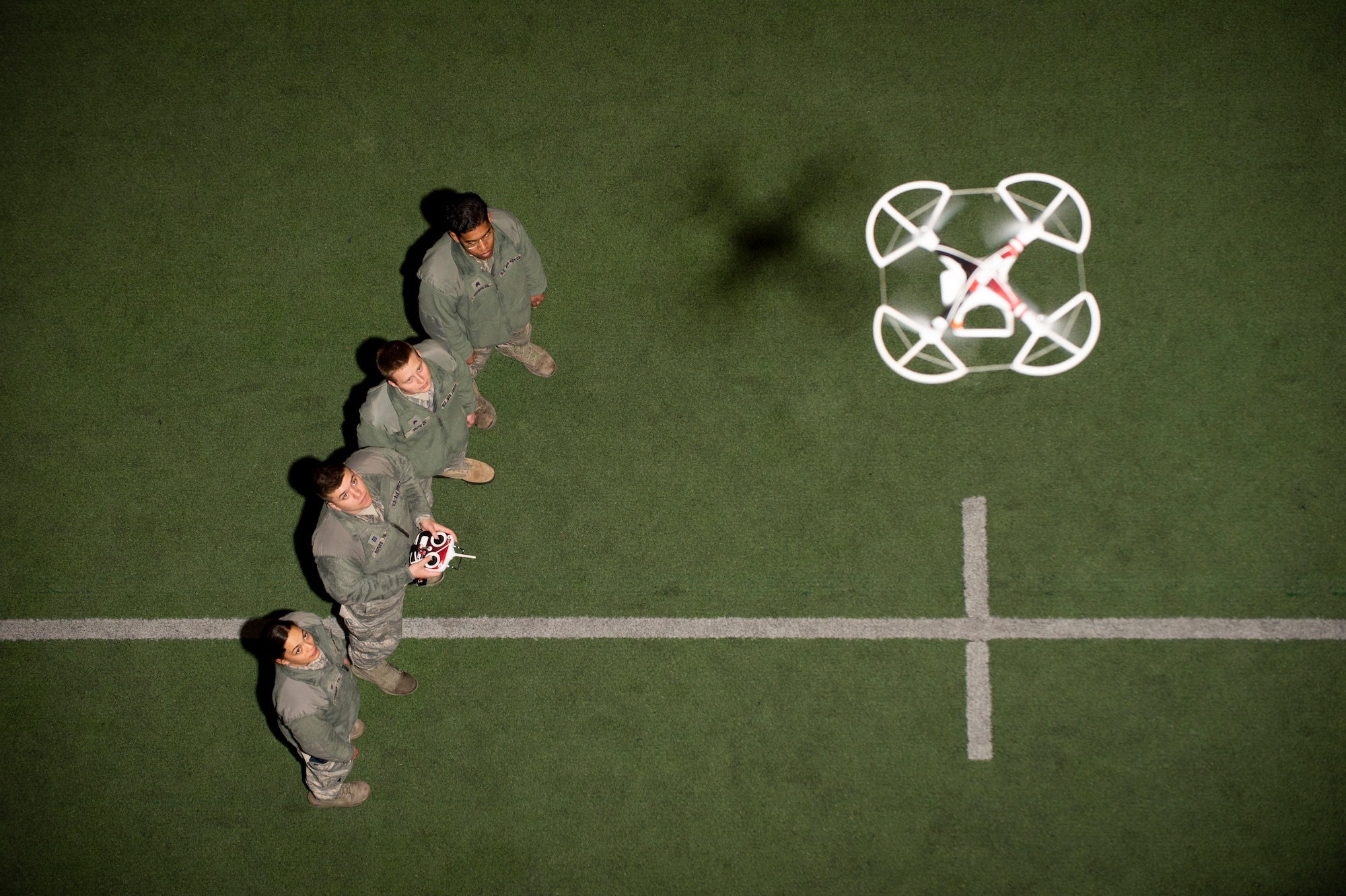 United States Air Force Academy Cadets in the Unmanned Aerial System (UAS) Operations Program familiarize themselves with quadcopter flight controls at The Cadet Field House, Monday March 4th, 2019. (U.S. Air Force photo/Joshua Armstrong)