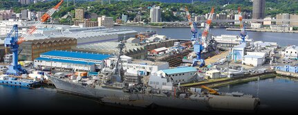 YOKOSUKA, Japan (May 4, 2017) – From front to back, USS Benfold (DDG 65) docked in availability and USS Chancellorsville (CG 62) dry-docked at Ship Repair Facility and Japan Regional Maintenance Center. (U.S. Navy Photo by John Page, SRF-JRMC Corporate Communications/Released)