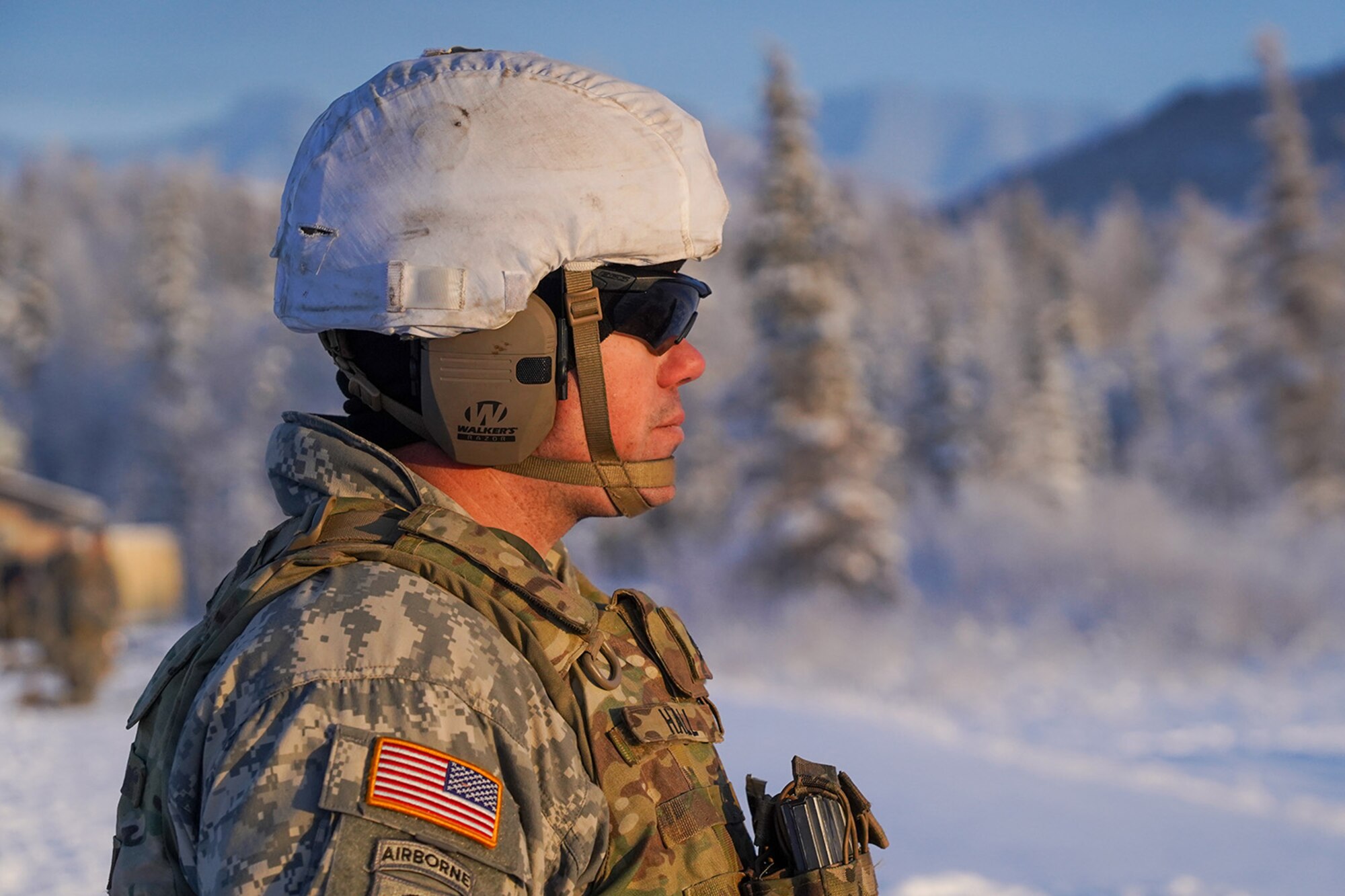Army Staff Sgt. Tyler Hall, a native of Orlando, Fla., oversees paratroopers assigned to the 2nd Battalion, 377th Parachute Field Artillery Regiment, 4th Infantry Brigade Combat Team (Airborne), 25th Infantry Division, U.S. Army Alaska, using M2 machine guns while conducting live-fire qualification at Grezelka range, on Joint Base Elmendorf-Richardson, Alaska, Dec. 5, 2019. The Soldiers practiced identifying, and engaging targets at varying distances to solidify their proficiency with the weapons in sub-arctic conditions.