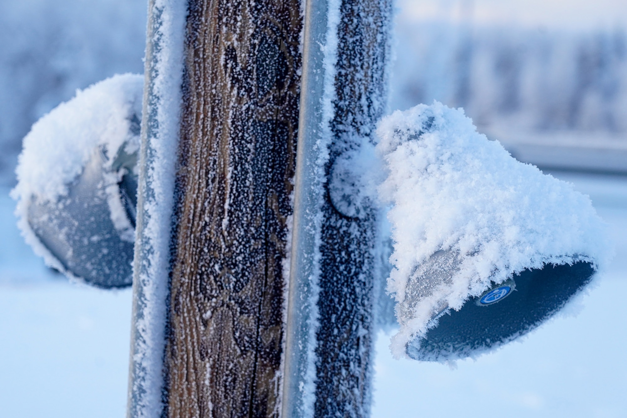 Hoar frost is seen public address speakers as paratroopers assigned to the 2nd Battalion, 377th Parachute Field Artillery Regiment, 4th Infantry Brigade Combat Team (Airborne), 25th Infantry Division, U.S. Army Alaska, use M240B, and M2 machine guns while conducting live-fire qualification at Grezelka range, on Joint Base Elmendorf-Richardson, Alaska, Dec. 5, 2019. The Soldiers practiced identifying, and engaging targets at varying distances to solidify their proficiency with the weapons in sub-arctic conditions.