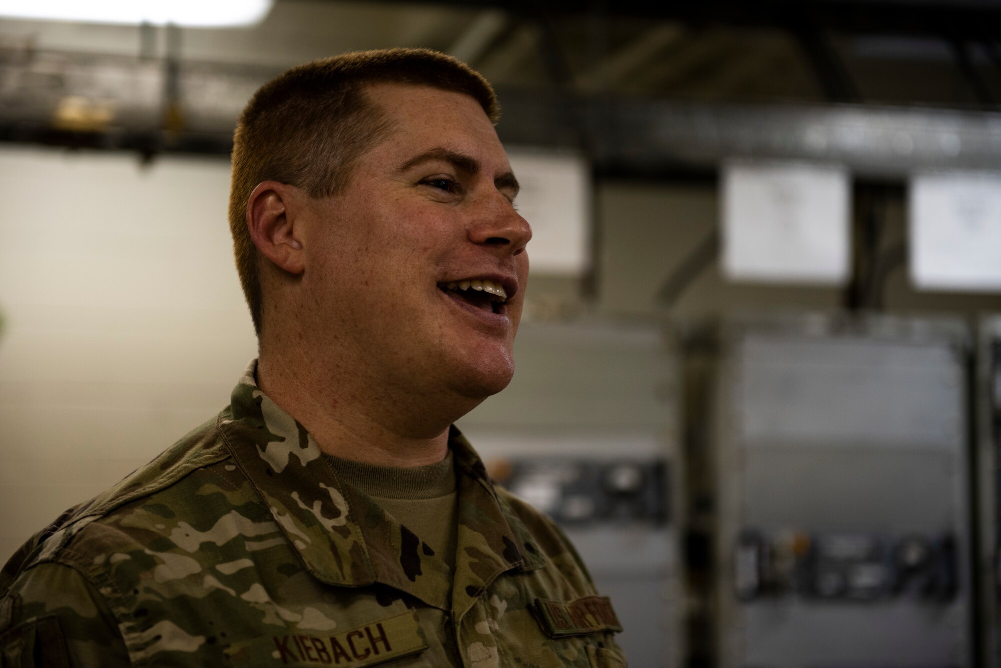 U.S. Air Force Staff Sgt. Christopher Kiebach, 325th Operations Support Squadron Radar, Airfield, and Weather Systems supervisor has a conversation at Tyndall Air Force Base, Florida, Nov. 26, 2019. Kiebach and his team maintain air traffic and control systems for Tyndall including all means of communication from air traffic controllers to aircraft operators via radio, as well as interagency communication via telephones. Kiebach is originally from Sierra Vista, Arizona, and has been in the service for ten years. (U.S. Air Force photo by Staff Sgt. Magen M. Reeves)