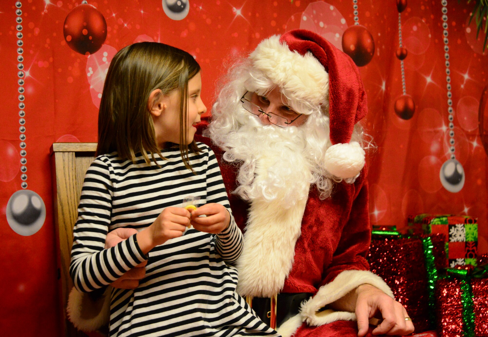 Photo of Santa Claus at Christmas tree lighting event.