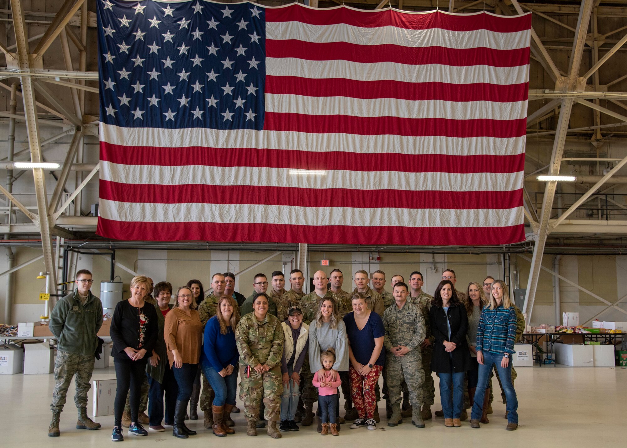Treats2Troops volunteers pose for a group photo at Fairchild Air Force Base, Washington, Dec. 3, 2019.