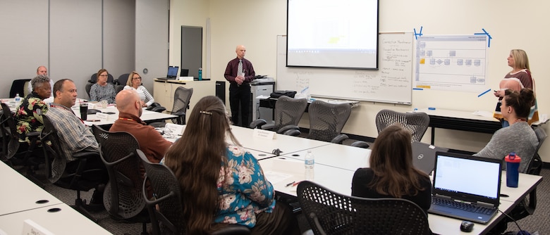 Participants of a three-day value engineering workshop for the Furnishings Program review the results of the Function Analysis Phase before diving into the Creative Phase at the U.S. Army Engineering and Support Center, Huntsville, Alabama, Nov. 4, 2019.