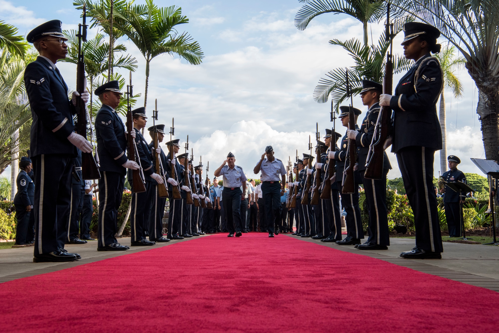 U.S. Air Force Chief of Staff Gen. David L. Goldfein and Gen. CQ Brown, Jr., Pacific Air Forces commander, walk through the 2019 Pacific Air Chiefs Symposium Honor Cordon on Joint Base Pearl Harbor-Hickam, Hawaii, Dec. 5, 2019.