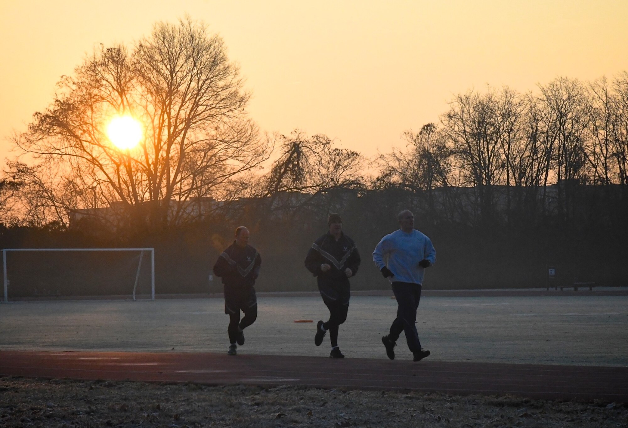 932nd Citizen Airmen perform the 1.5 mile run as part of the Air Force Fitness assessment November 16, 2019, at Scott Air Force Base, Illinois. The weather was pleasantly warm once the sun rose and provided light. Fitness test also include pushups, sit-ups and height and weight measurements.
(U.S. Air Force photo by Lt. Col. Stan Paregien)