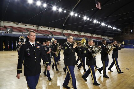 Members of the 257th Army Band, District of Columbia National Guard, march during the Annual Awards and Decorations Ceremony on December 8, 2019 at the DCNG Armory, Washington, D.C. The ceremony included a ‘pass and review’ marching element and presentation of awards and year-end review video. (Photo by Staff Sgt. Tyrone Williams/Released)
