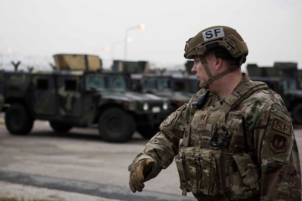 U.S. Air Force Capt. Jeremiah Baxter, 39th Security Forces Squadron operations officer, surveys Humvees during an exercise Nov. 27, 2019, at Incirlik Air Base, Turkey. The 39th SFS conducts random exercises to enhance the mission readiness of its Airmen. (U.S. Air Force photo by Staff Sgt. Joshua Magbanua)