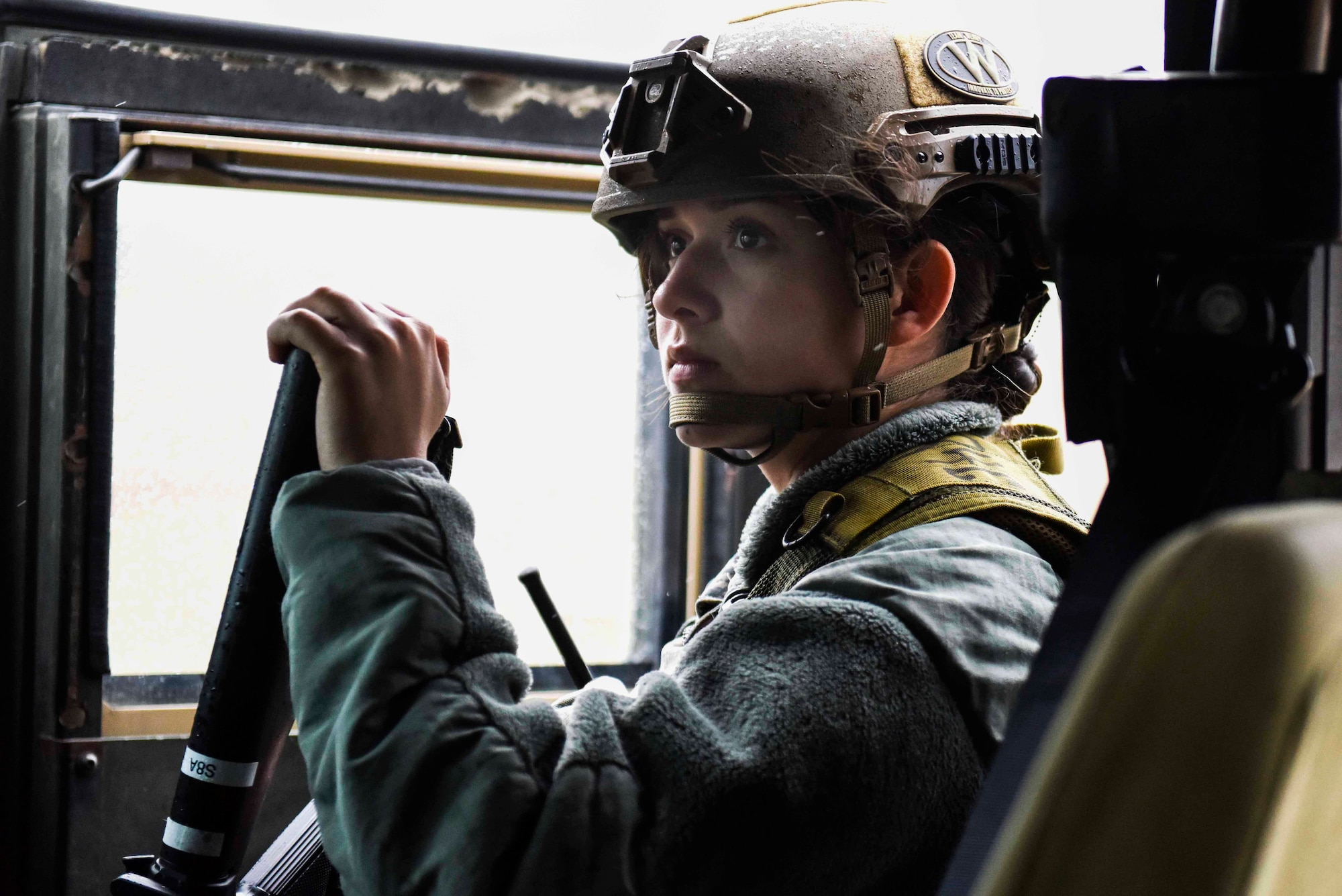 A response team member assigned to the 39th Security Forces Squadron enters a vehicle during an exercise Nov. 27, 2019, at Incirlik Air Base, Turkey. Security forces Airmen practice during various exercises to ensure they are always ready to protect the Air Force’s Airmen and assets. (U.S. Air Force photo by Staff Sgt. Joshua Magbanua)