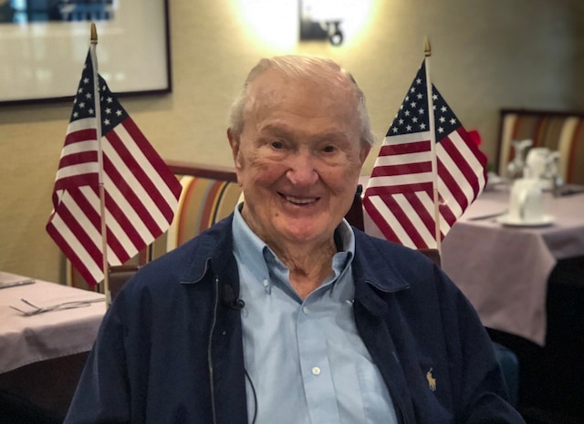 U.S. Marine veteran John Campbell, a World War II pilot and Pearl Harbor survivor awaits his lunch during a Veterans Day Luncheon at La Vida Del Mar in Solana Beach, California, Dec. 6, 2019.Campbell was present during the Pearl Harbor bombing and was recognized during the luncheon as being the oldest Pearl Harbor survivor in San Diego county.
