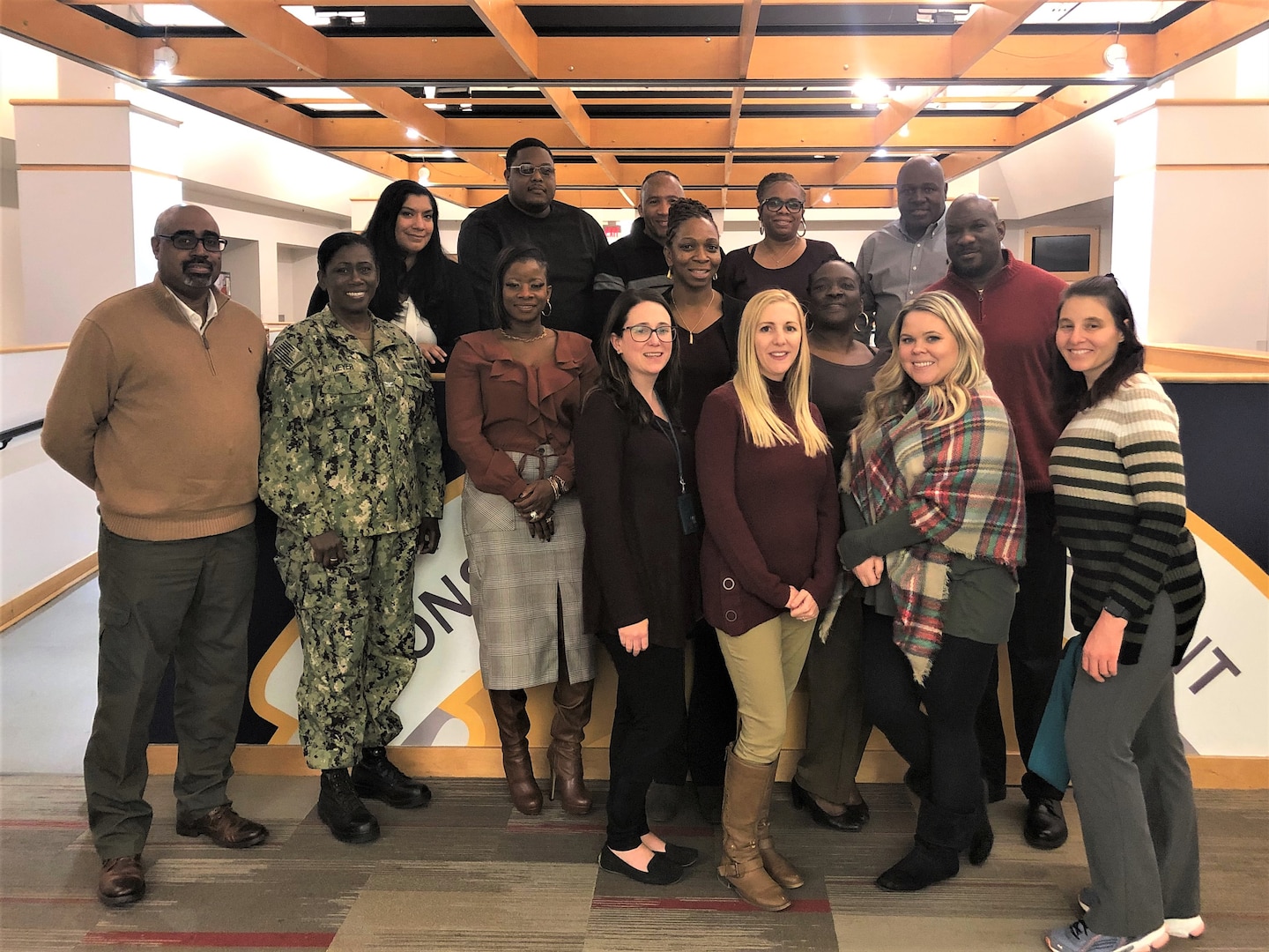 Members of the Construction and Equipment supply chain’s Culture Improvement Team pose with Capt. Jacqueline Meyer, the supply chain director, during the group’s holiday luncheon. The event was held Dec. 5, 2019 at the Defense Logistics Agency Troop Support Headquarters in Philadelphia.