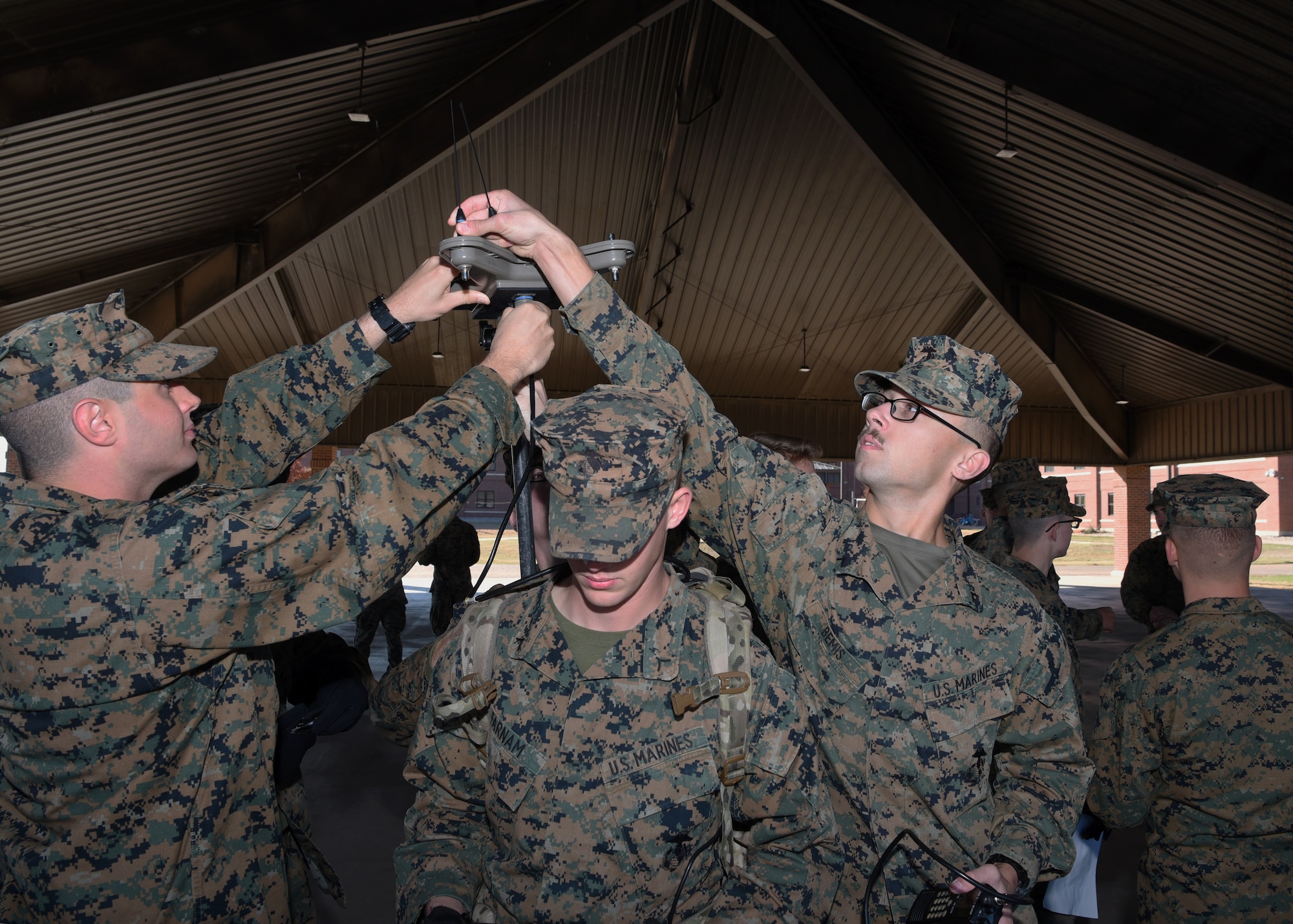U.S. Marine Corps Detachment students put together a versatile radio observation and direction finder in preparation for an intelligence field exercise outside of the MCD on Goodfellow Air Force Base, Texas, Dec. 6, 2019. Goodfellow falls under the Air Education and Training Command and offers exceptional training for all branches of the military and America’s Allies. (U.S. Air Force Photo by Airman 1st Class Abbey Rieves)
