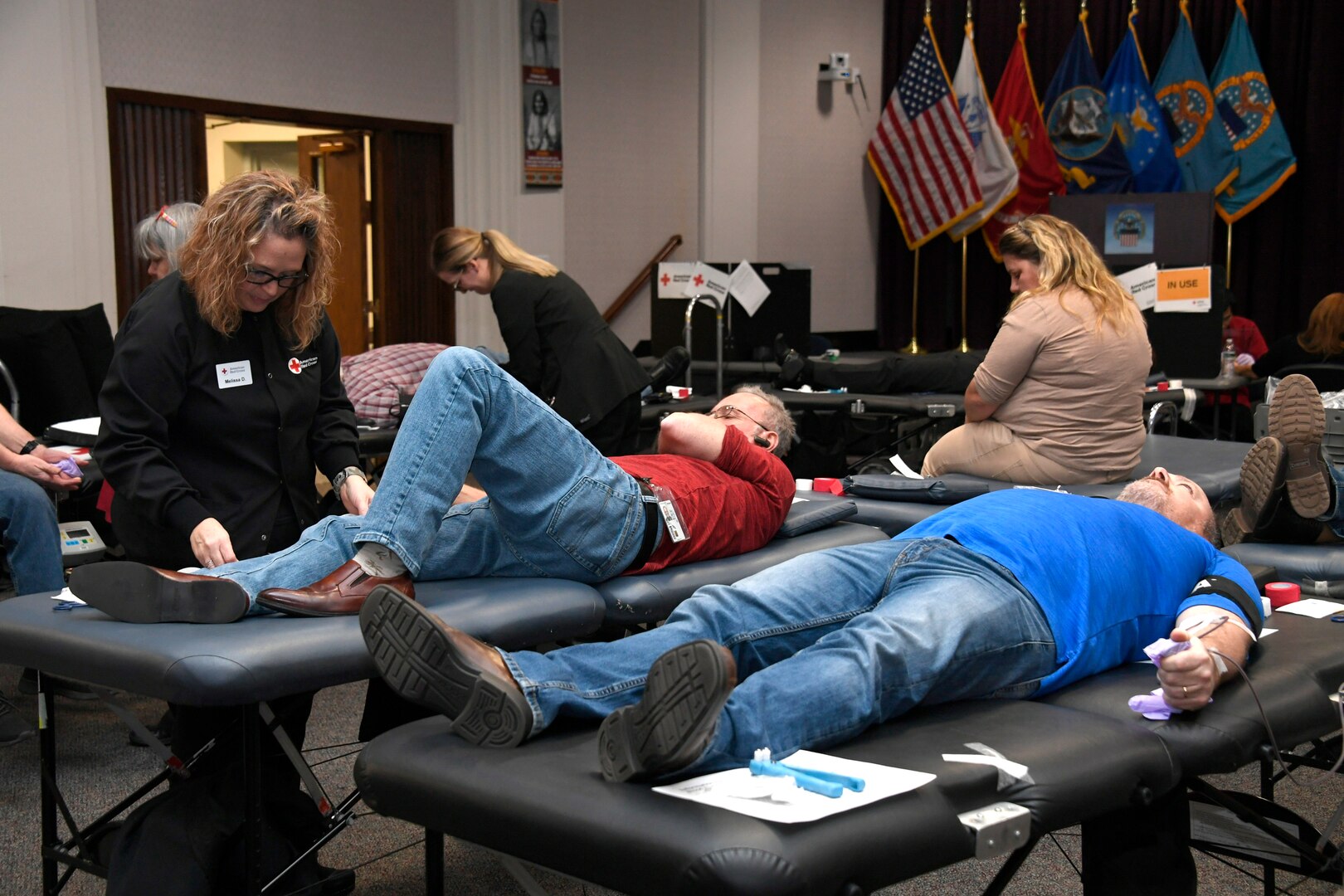 Employees at the Hart-Dole-Inouye Federal Center donate their blood during the Dec. 4 American Red Cross blood drive.