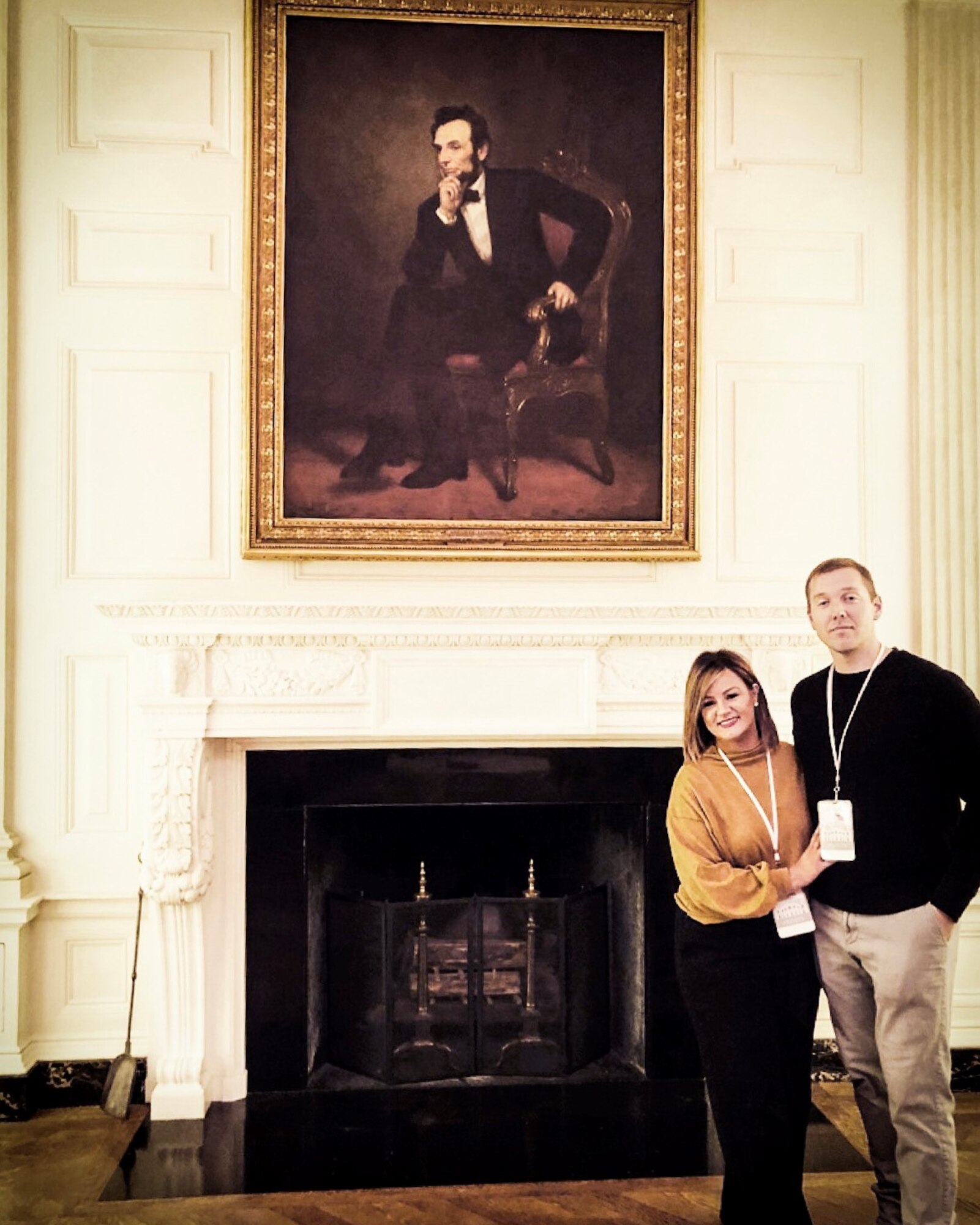 Volunteers stand inside the White House.