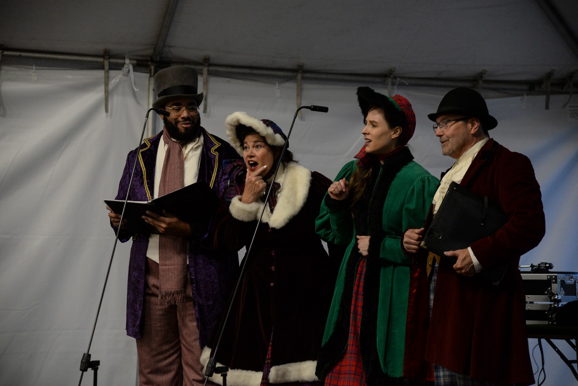 a photo of Singers providing live music during a base holiday event.