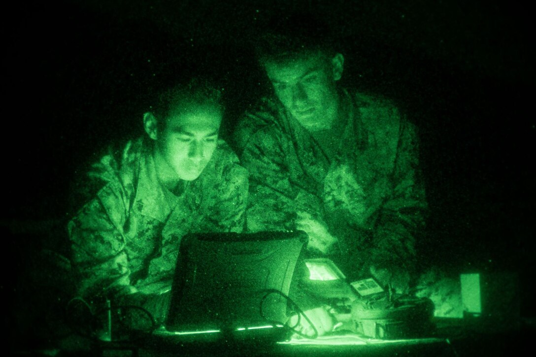 U.S. Marine Lance Cpl. Dannie Barnes, left, a mortarman with 2nd Battalion, 5th Marine Regiment, 1st Marine Division, and Cpl. Michael Misbach, an intelligence specialist with 2nd Bn., 5th Marines, 1st MarDiv, monitor the location of an RQ-20 Puma unmanned aircraft system during Operation Buck Rogers on Marine Corps Base Camp Pendleton, California, Dec. 3, 2019. Operation Buck Rogers is used to count the mule deer population on Camp Pendleton and the use of Pumas is a cheaper and more effective alternative to complete the task. The survey of Camp Pendleton’s deer population is done once a year. Misbach is a native of East Haven, Connecticut, and Barnes is a native of Wataga, Illinois. (U.S. Marine Corps photo by Lance Cpl. Alison Dostie)