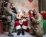 The Bracy family participates in the Airman and Family Readiness Center’s Sensory Santa at Barksdale Air Force Base, La., Dec. 6, 2019. The event is specifically for Exceptional Family Member Program families to celebrate the holidays in a sensory-friendly atmosphere. (U.S. Air Force photo by Staff Sgt. Philip Bryant)