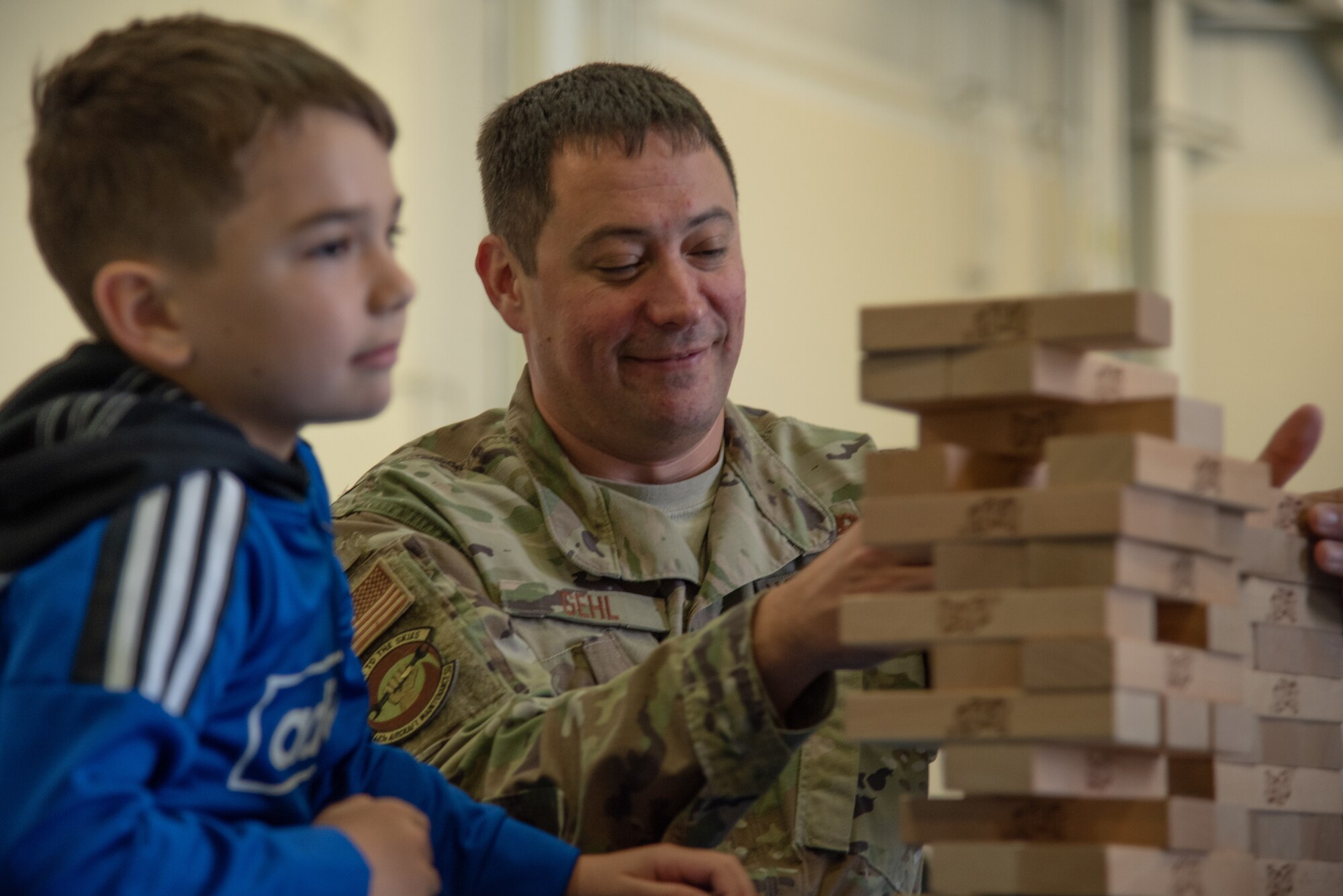 The Top Three hosted the 403rd Wing Children’s Holiday Party Dec. 7, at Keesler Air Force Base, Miss. The event included family fun activities such as games, face painting, an inflatable bounce house, crafts, and pictures with Santa Clause. The event focused on building comradery and gave leadership a chance to show thanks to Airmen and their families for their selfless service throughout the year. (U.S. Air Force photo by Staff Sgt. Shelton Sherrill)
