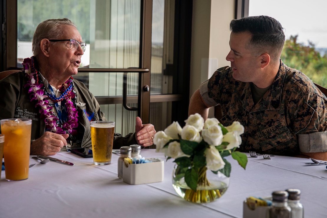 Tom Foreman, retired U.S. Navy gun director, speaks to U.S. Marine Corps Sgt. Maj. Charles Wells, sergeant major, Marine Corps Base Hawaii, during his visit, MCBH, Dec. 5, 2019. The Best Defense Foundation returned 6 WWII Pearl Harbor and Naval Air Station Kaneohe Bay survivors to Hawaii for the 78th Commemoration of Pearl Harbor and Naval Air Station Kaneohe Bay which is now MCBH. The heroes returned were Jack Holder US NAVY - Naval Air Station, Kaneohe Bay; Tom Foreman US Navy - USS Cushing; Ira Schab US Navy - USS Dobbin; Stuart Hedley US Navy - USS West Virginia; Donald Long US Navy - Naval Air Station, Kaneohe Bay; and Chuck Kohler US Navy - USS Hornet.