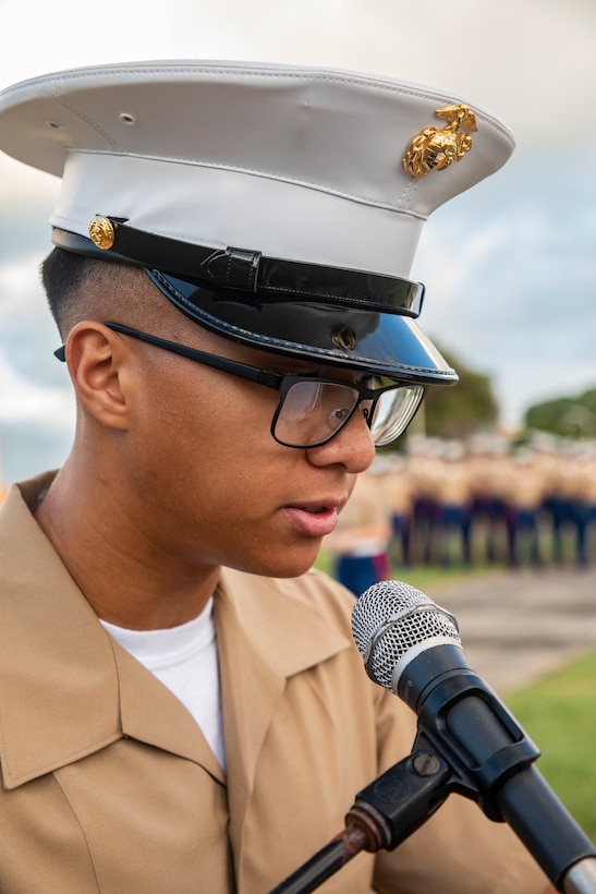 U.S. Marine Corps LCpl. Jacob Dilata, Marine Corps Air Station Kaneohe Bay, narrates during the annual Klipper Ceremony, Marine Corps Base Hawaii, Dec. 7, 2019. The Klipper Memorial was dedicated in 1981 to honor the 17 U.S. Navy Sailors and two civilian contractors who died during the attack on Naval Air Station Kaneohe Bay on Dec. 7, 1941.