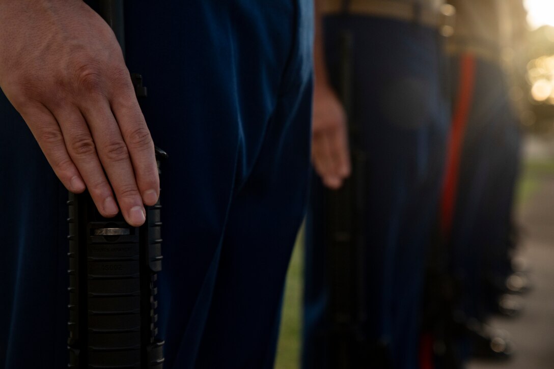 U.S. Marines with the rifle detail for the annual Klipper Ceremony stand at attention, Marine Corps Base Hawaii, Dec. 7, 2019. The Klipper Memorial was dedicated in 1981 to honor the 17 U.S. Navy Sailors and two civilian contractors who died during the attack on Naval Air Station Kaneohe Bay on Dec. 7, 1941.