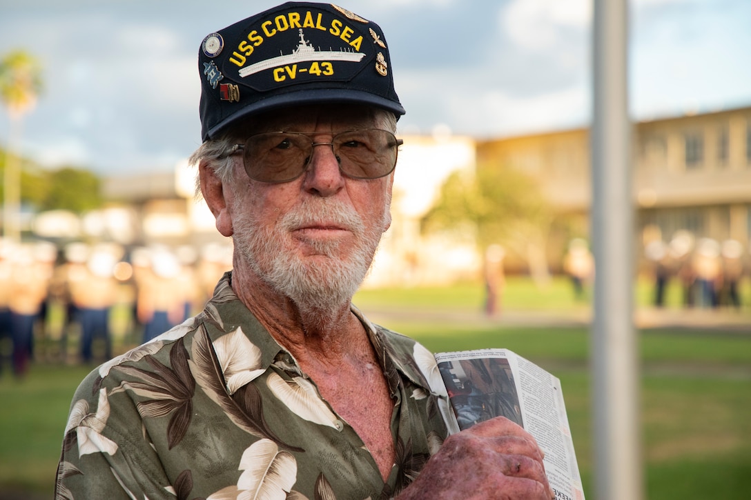 Mr. Daniel Griffin, a veteran whose father was present during the attack on Naval Air Station Kaneohe Bay, speaks with Marines before the annual Klipper Ceremony, Marine Corps Base Hawaii, Dec. 7, 2019. The Klipper Memorial was dedicated in 1981 to honor the 17 U.S. Navy Sailors and two civilian contractors who died during the attack on Naval Air Station Kaneohe Bay on Dec. 7, 1941.