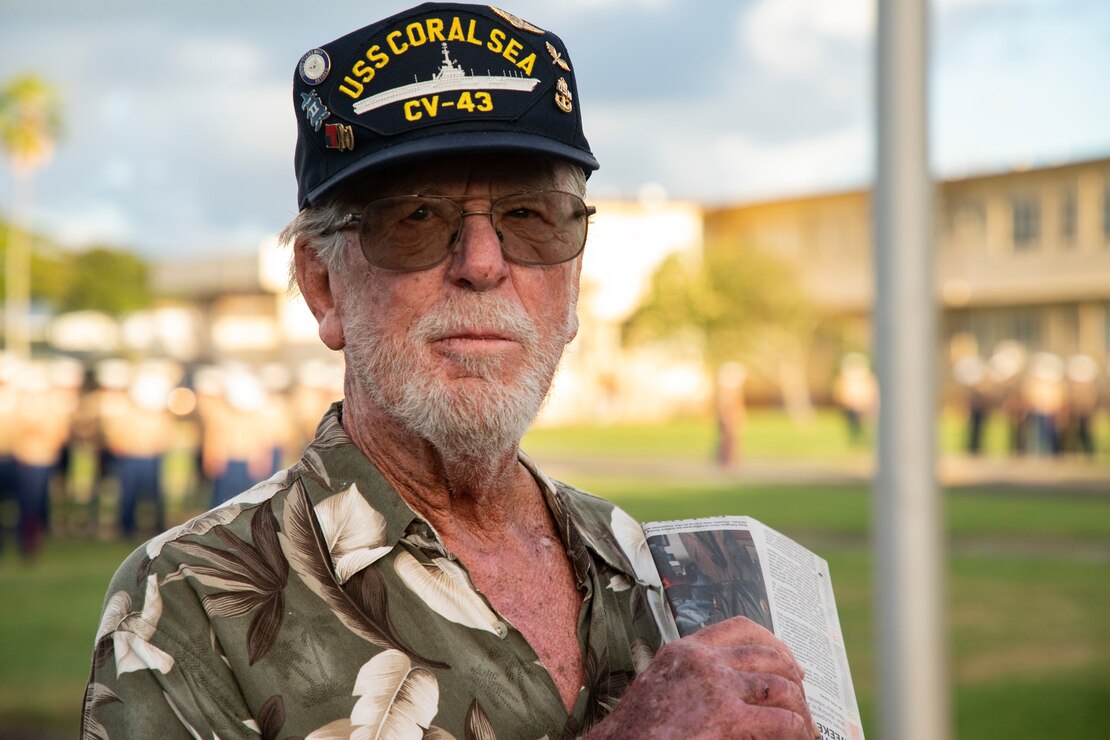 Mr. Daniel Griffin, a veteran whose father was present during the attack on Naval Air Station Kaneohe Bay, speaks with Marines before the annual Klipper Ceremony, Marine Corps Base Hawaii, Dec. 7, 2019. The Klipper Memorial was dedicated in 1981 to honor the 17 U.S. Navy Sailors and two civilian contractors who died during the attack on Naval Air Station Kaneohe Bay on Dec. 7, 1941.