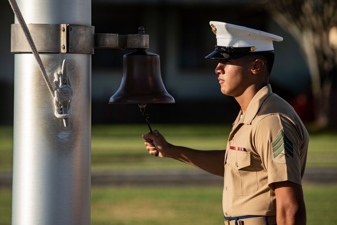 A U.S. Marine rings a bell for those who gave their lives on Dec. 7, 1941, during the Annual Klipper Ceremony held at Marine Corps Base Hawaii, Dec. 7, 2019. The Klipper Memorial was dedicated in 1981 to honor the 17 U.S. Navy Sailors and two civilian contractors who died during the attack on Naval Air Station Kaneohe Bay on Dec. 7, 1941.
